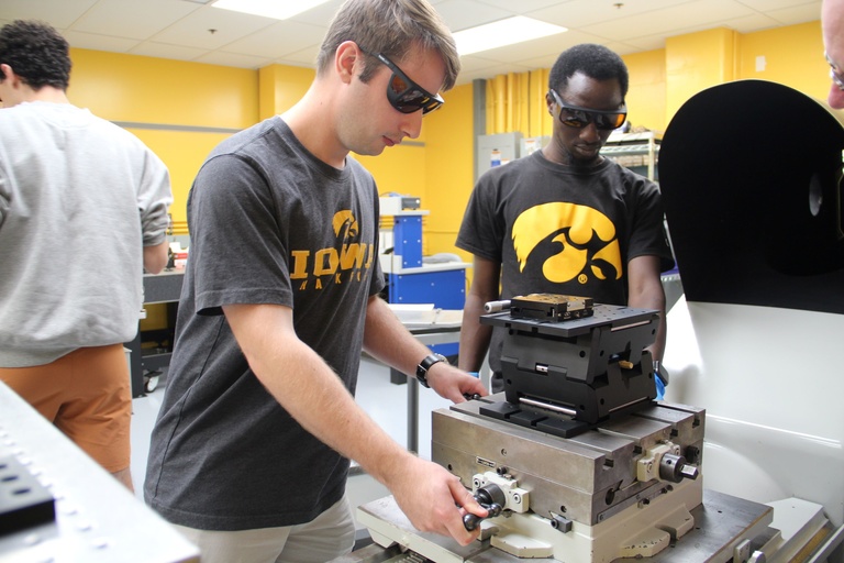 Grant Finneman and Bolaji Oladipo work in the lab.