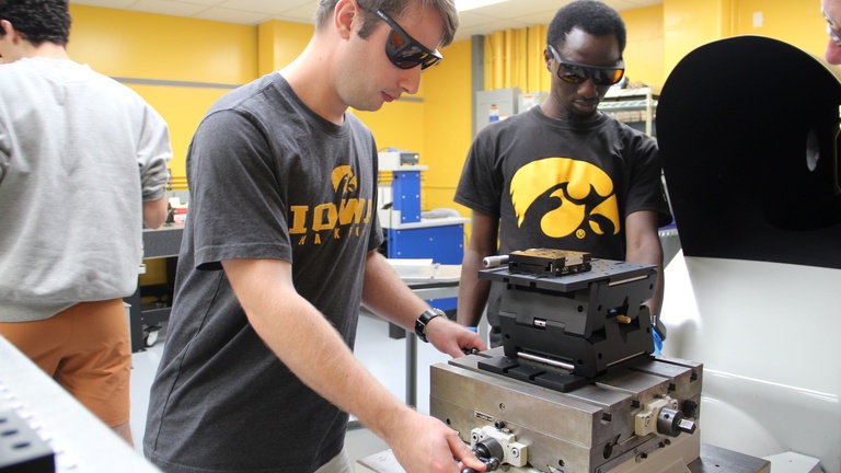 Grant Finneman and Bolaji Oladipo work in the lab.